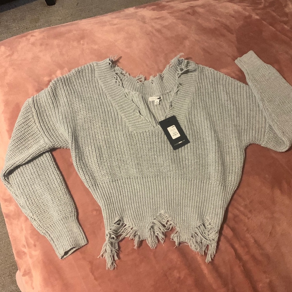 Distressed crop sweater